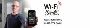 Male holding a phone with the Mitsubishi heat pump app opened